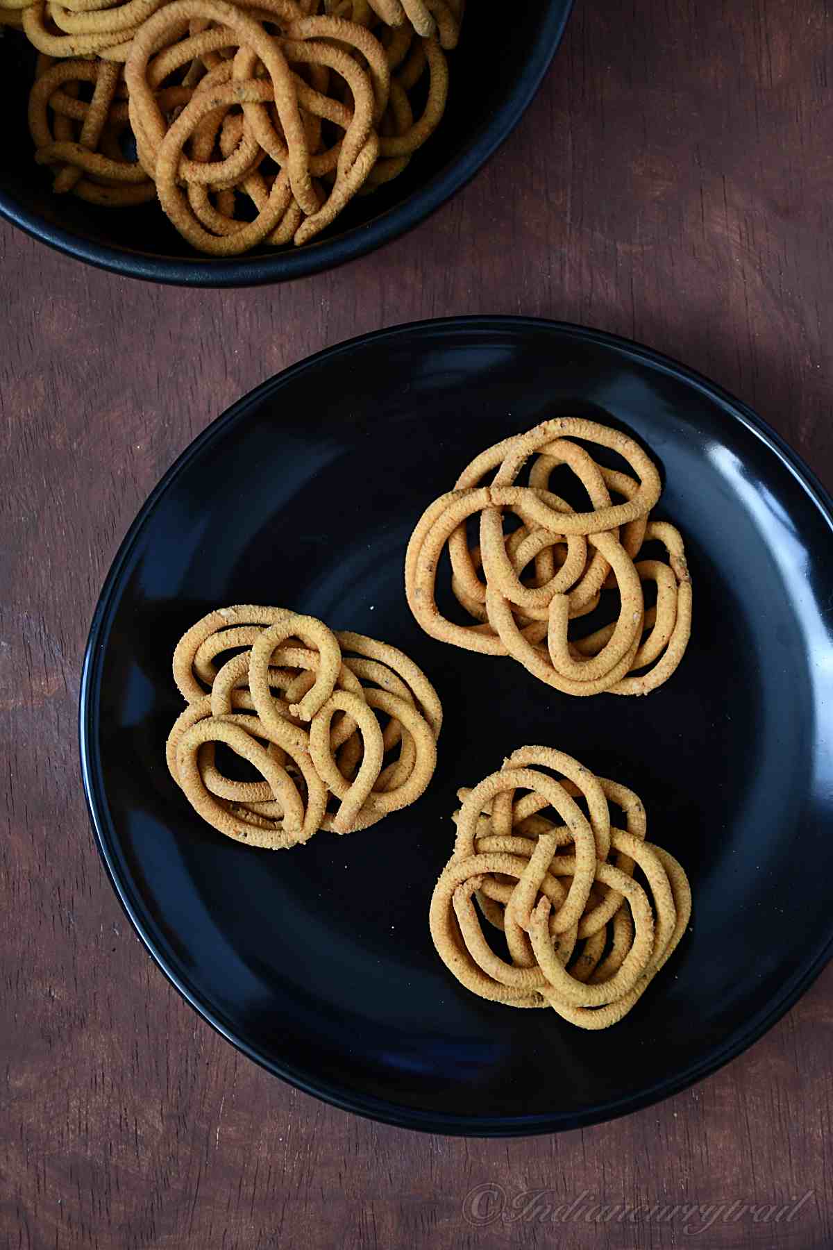 top view of 3 kadalai maavu murukku on a plate